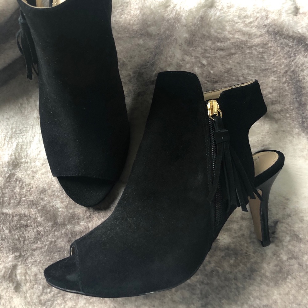 Black peep toe booties with fringe detailing